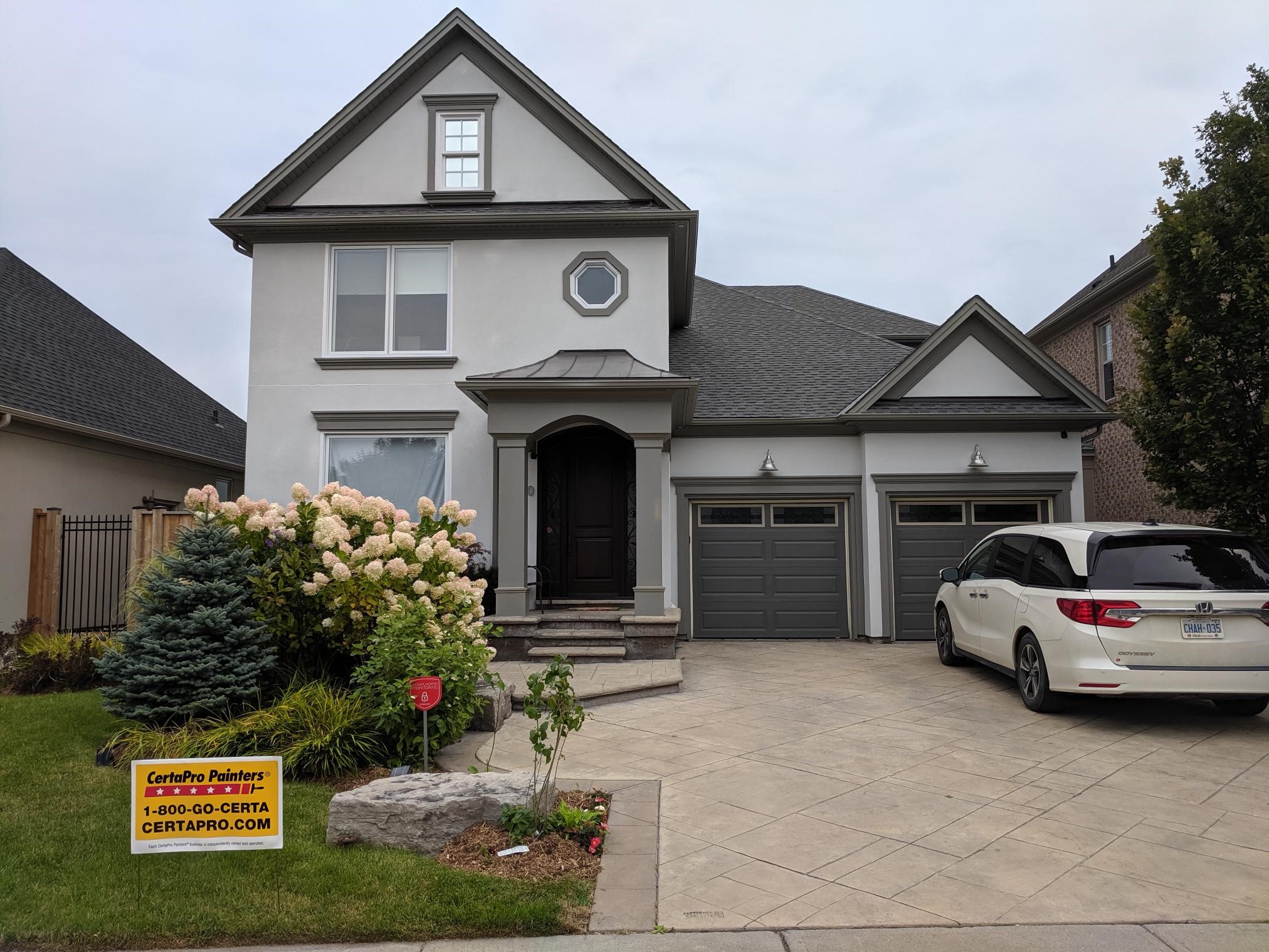 Residential exterior painting project after photo