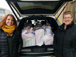 CertaPro Painters of Omaha - Delivering Presents to Open Door Mission