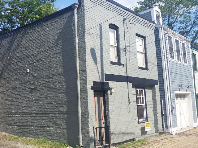 Two story brick after painting