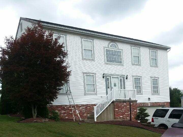 Exterior painting on wood siding, before picture