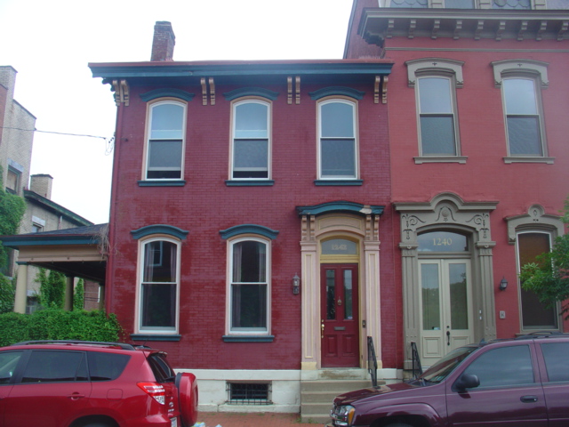 Exterior two story brownstone trim and doorway painting