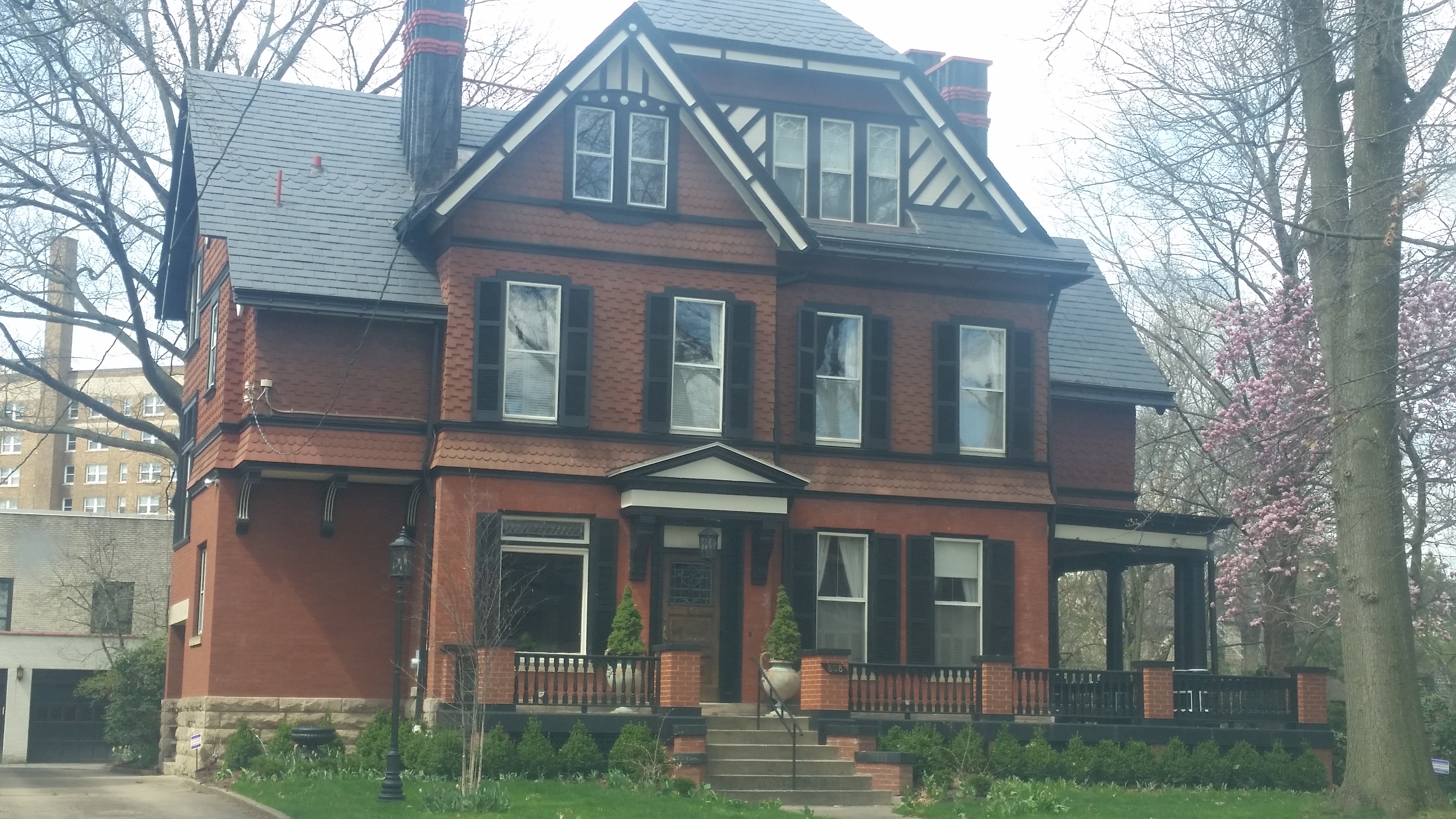 Exterior trim painting on brick exterior