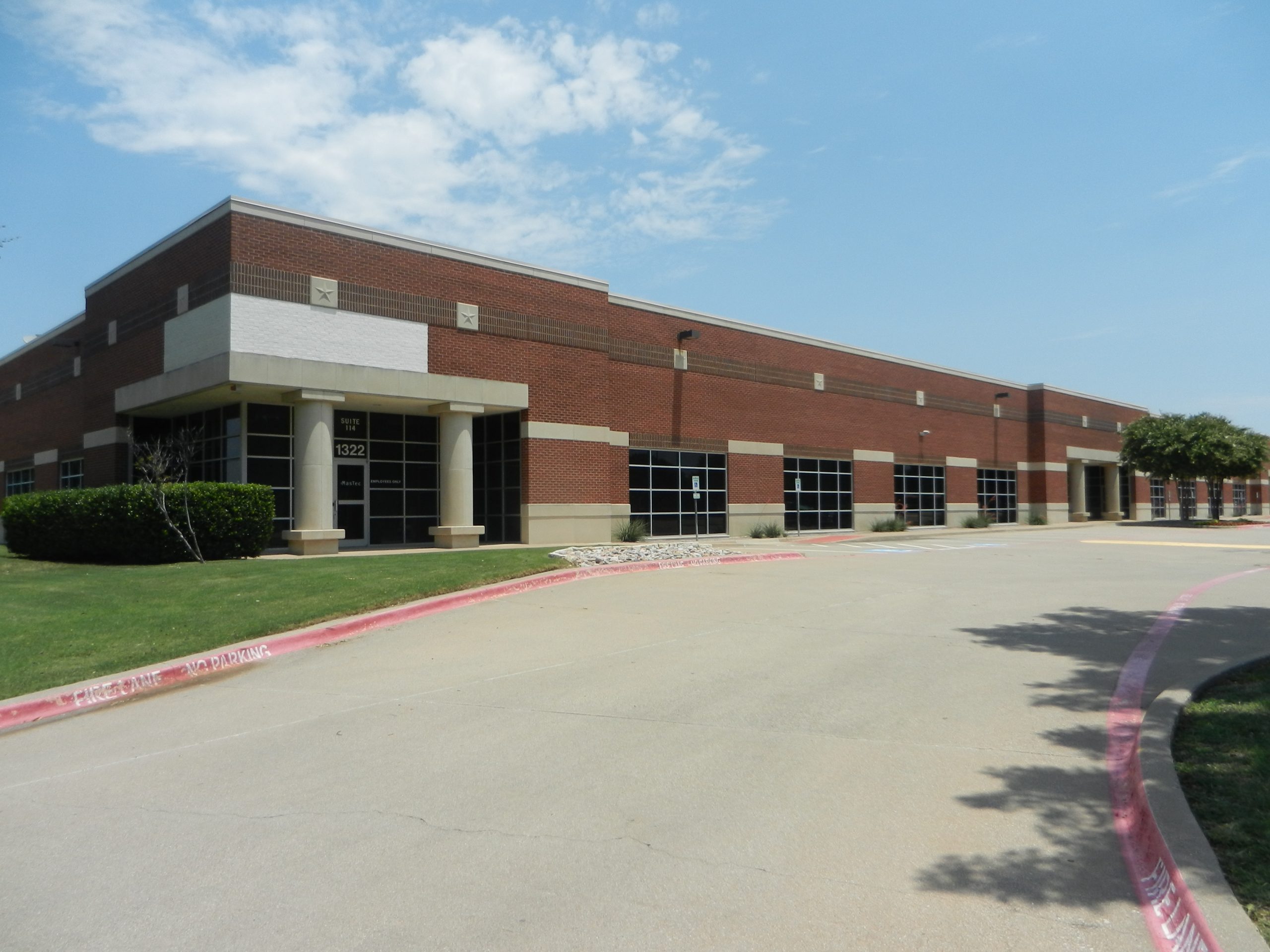 Coppell Tech Brick Painting - Before