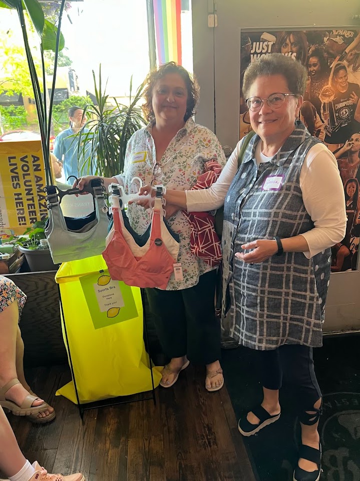 group of people posing at fundraiser event