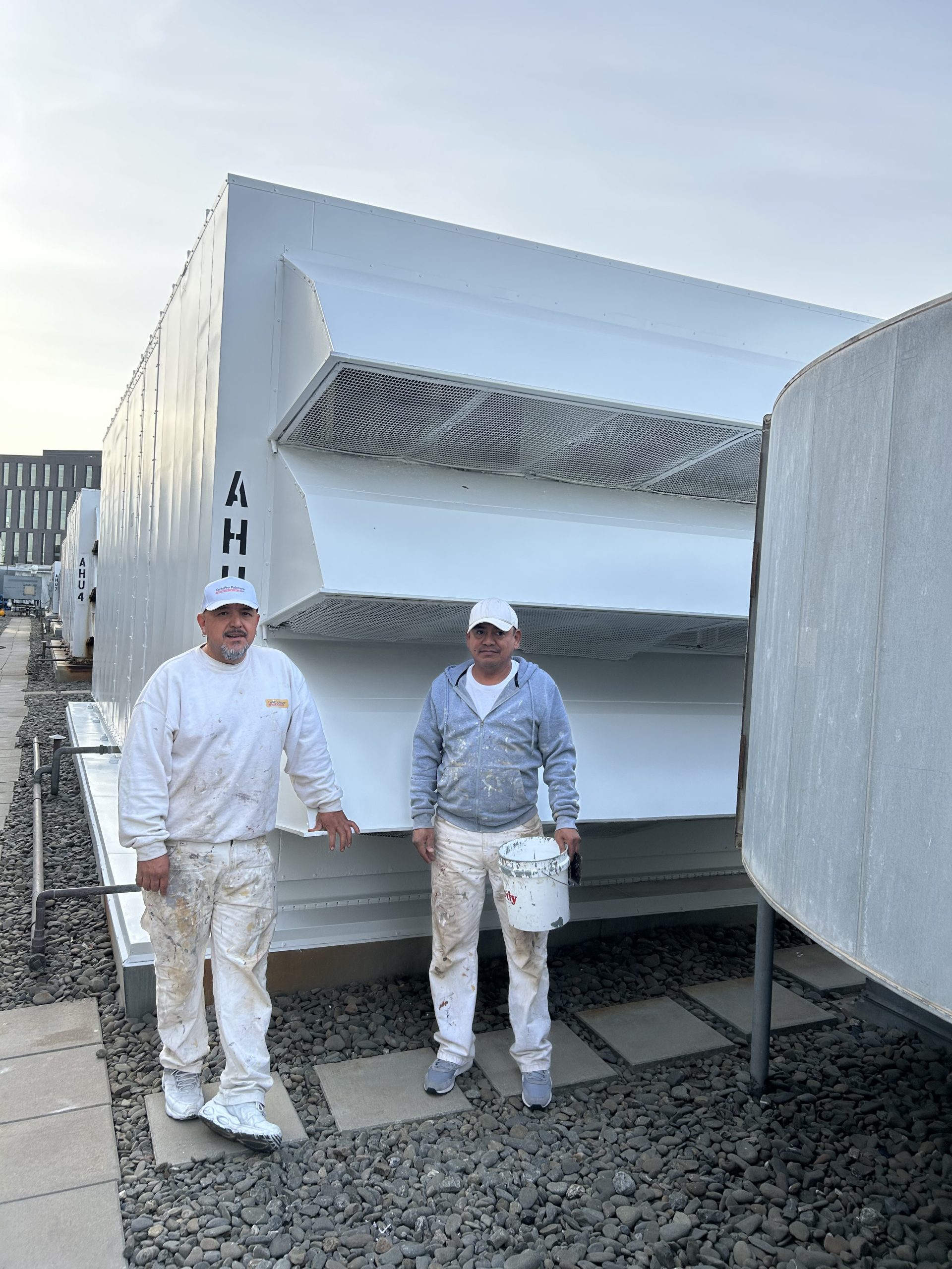 Gladstone Institute Air Handling Unit 3 with 2 CertaPro Painters in front