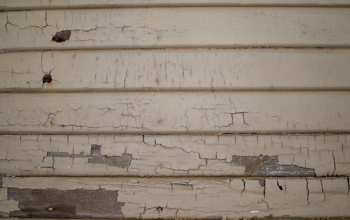 wearing out old house paint