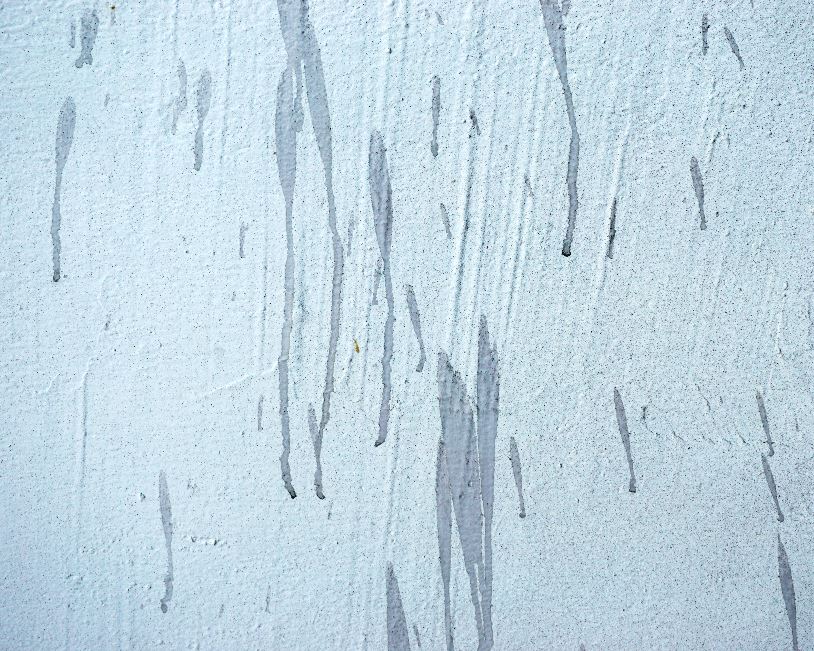 Stucco with water on it
