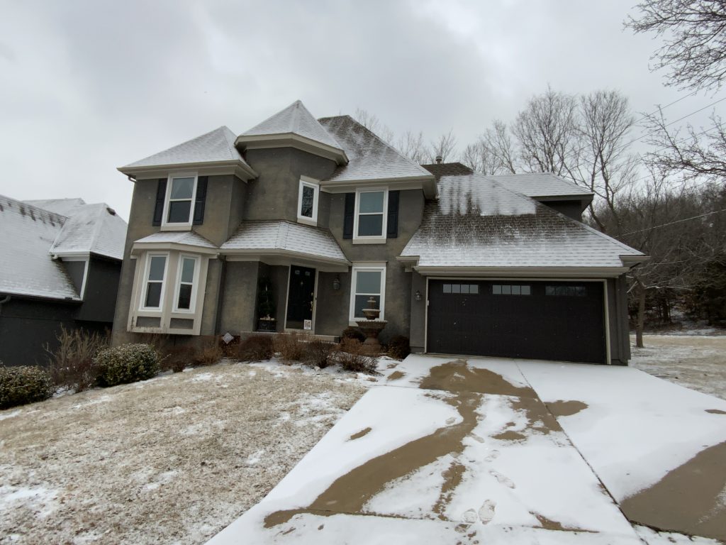 An exterior repaint in Lenexa Before