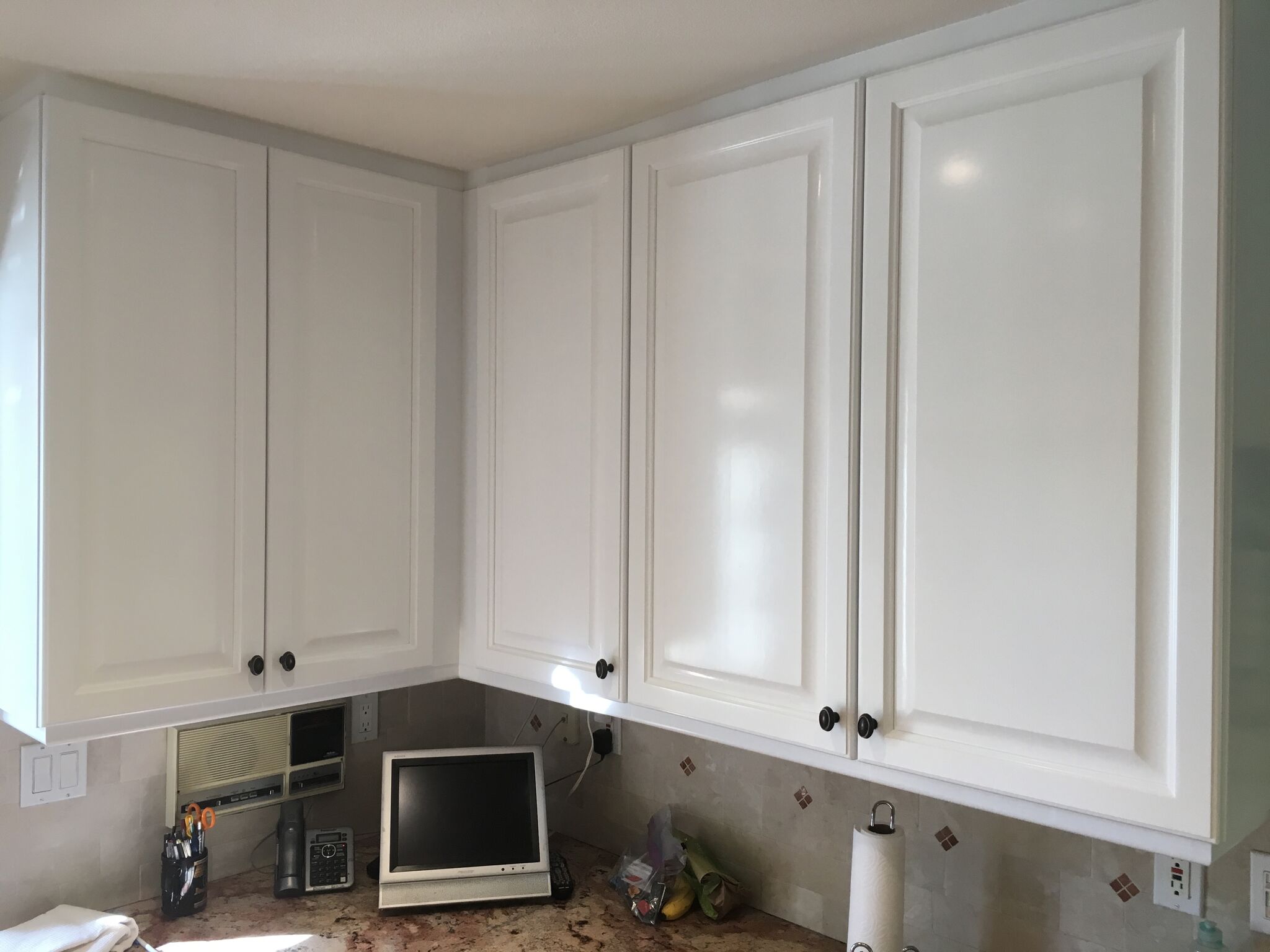 Interior kitchen cabinet painting by CertaPro house painters in Newbury Park, CA