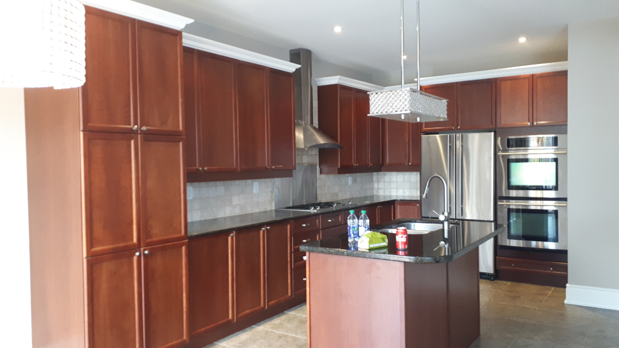 kitchen cabinets before repainting