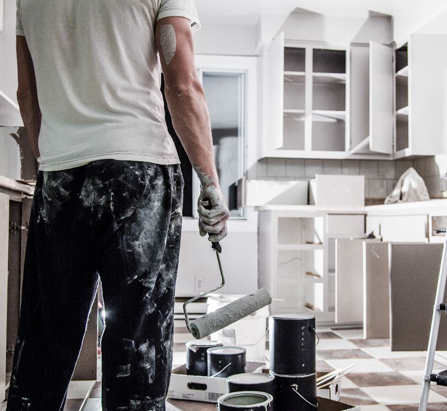 painter in kitchen