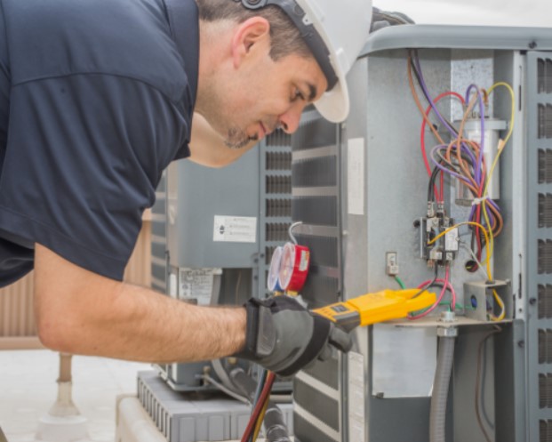 hvac professional testing home unit