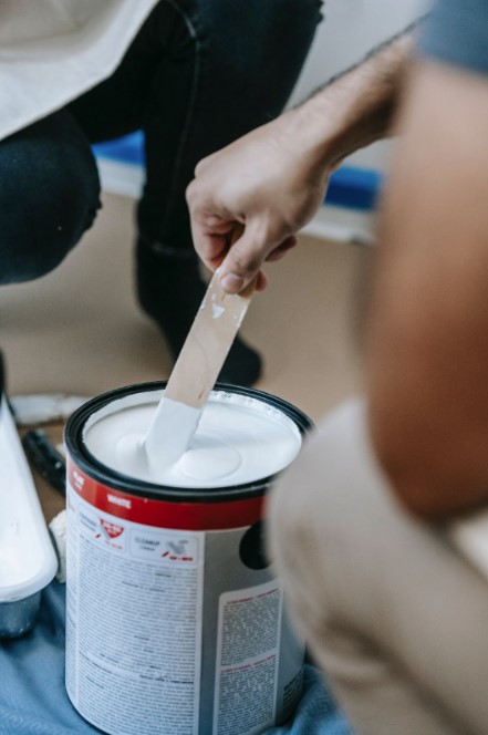 mixing a gallon of paint