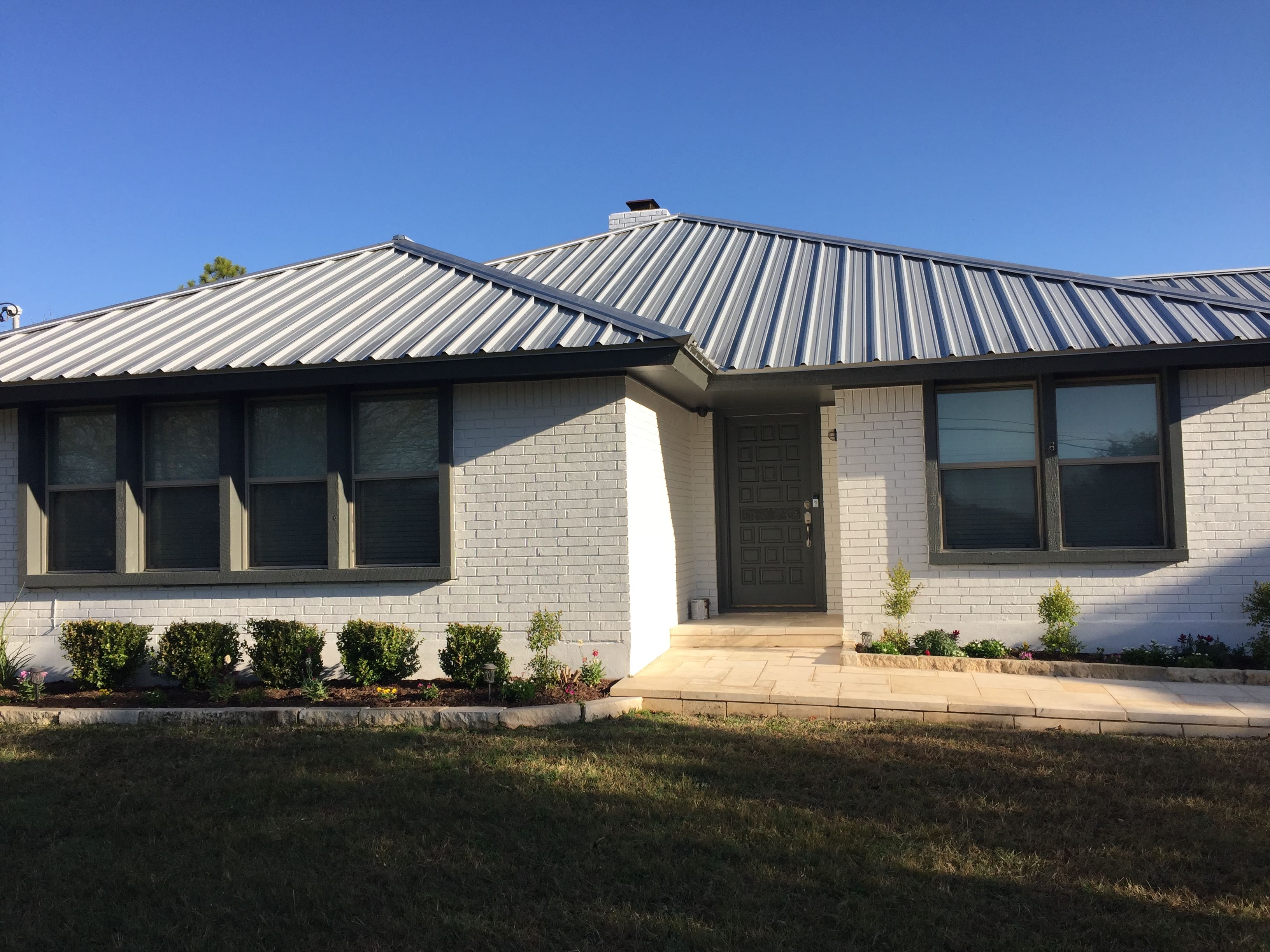 brick painted house austin tx