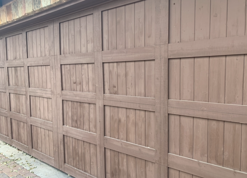 Garage Door Before the Refinished Look - faded wood color