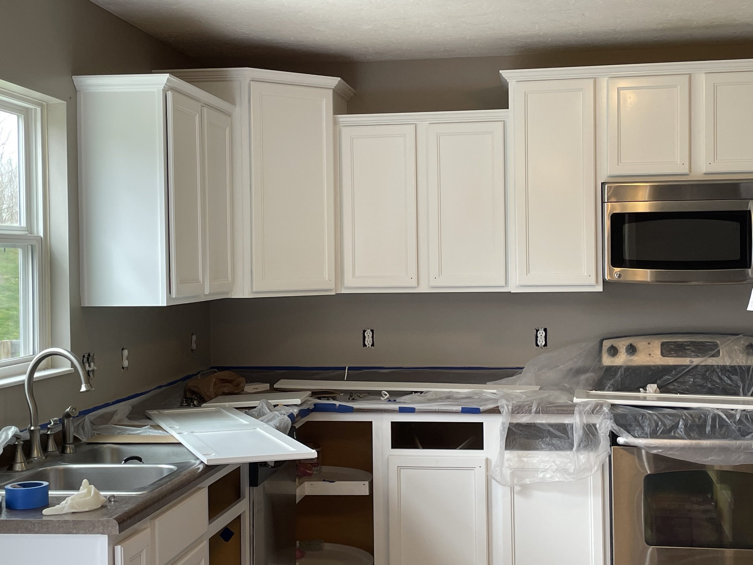 Before and After Cabinet Painting After