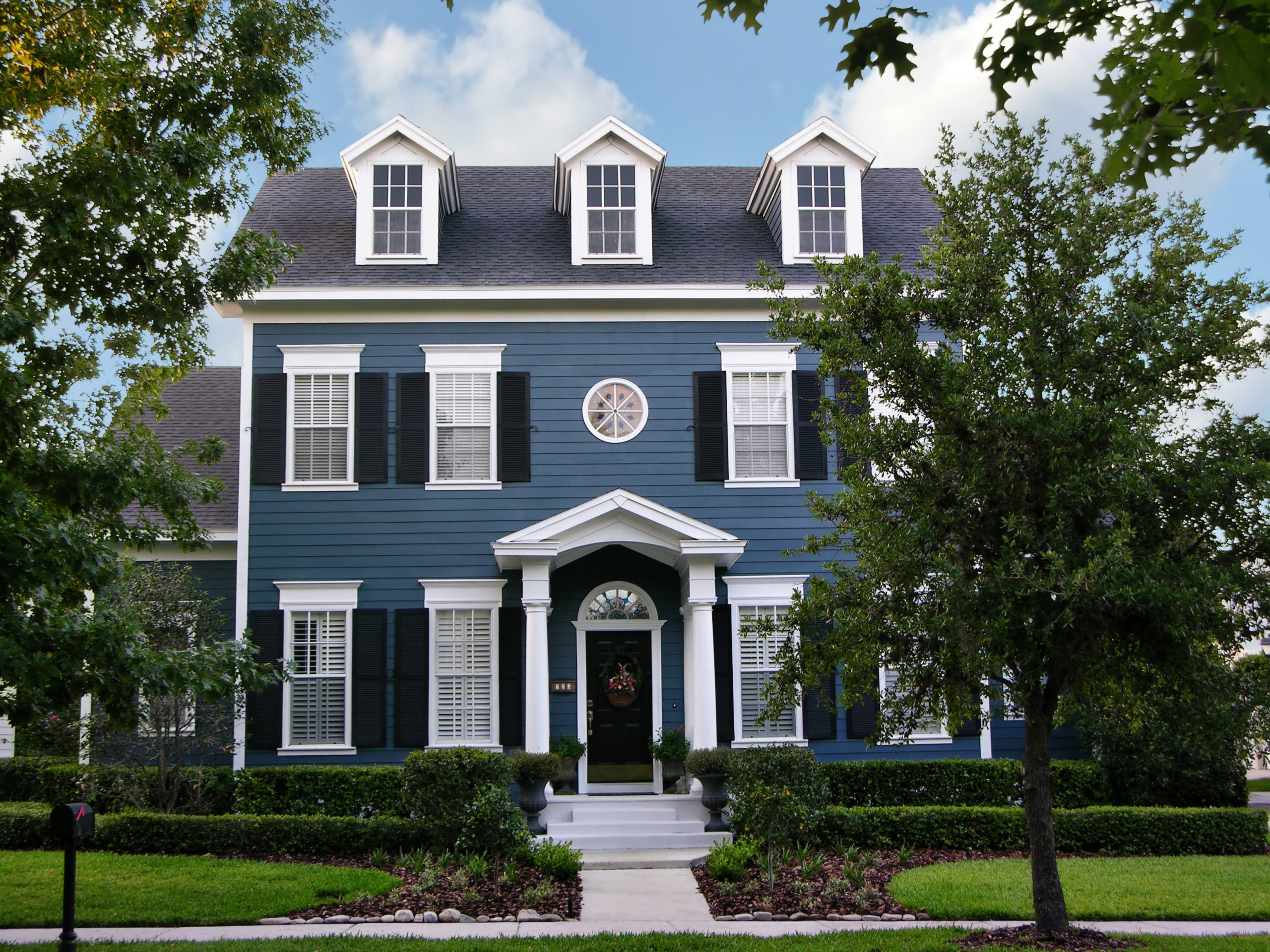 Blue Colonial - Painting Siding Exterior