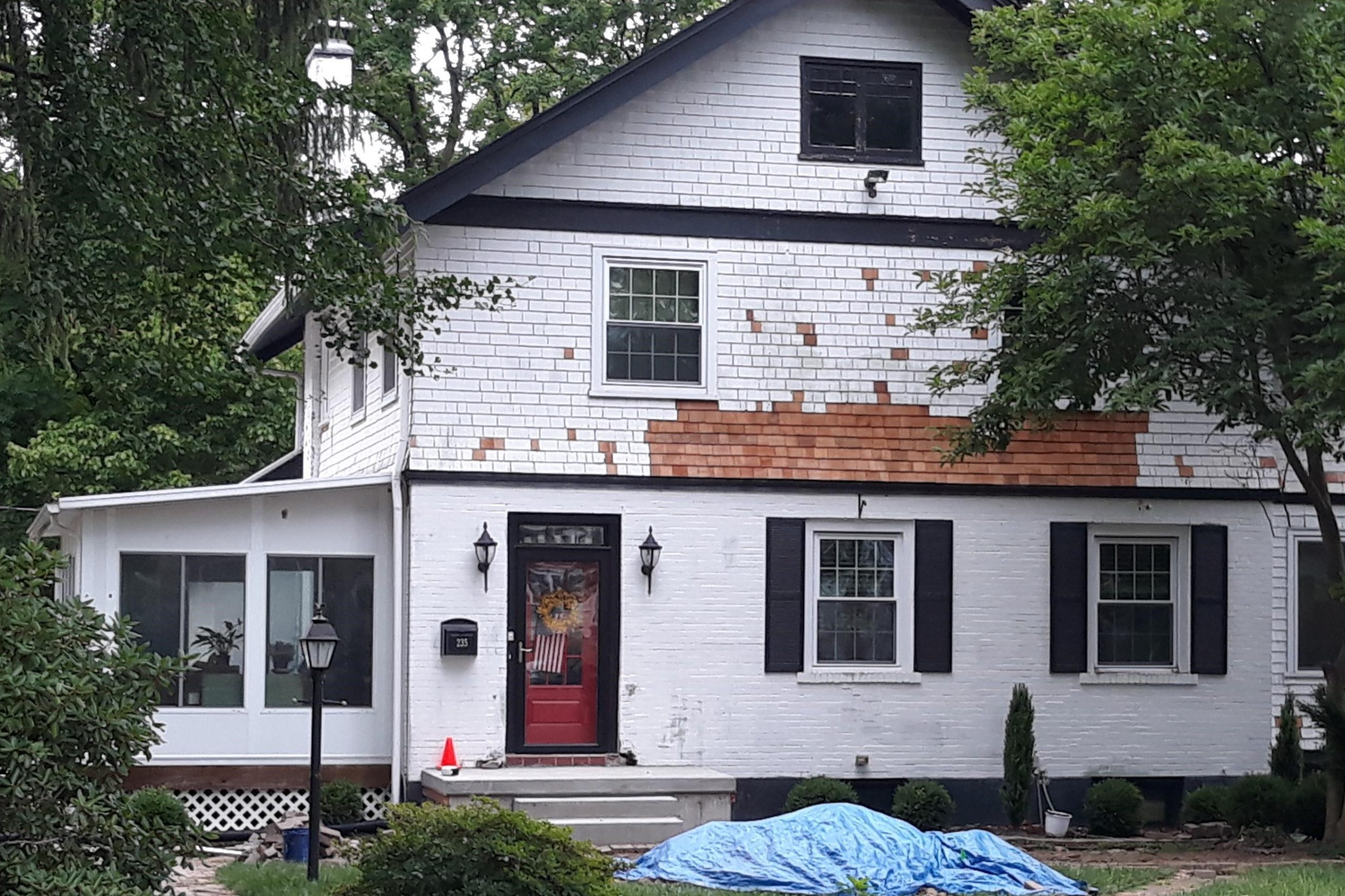 brick home before painting