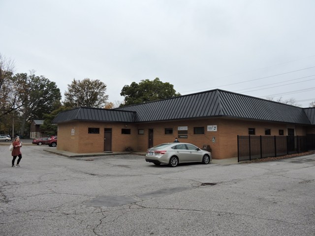 photo of office building before pressure wash and painting