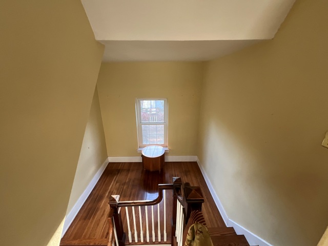 photo of hallway before being repainted
