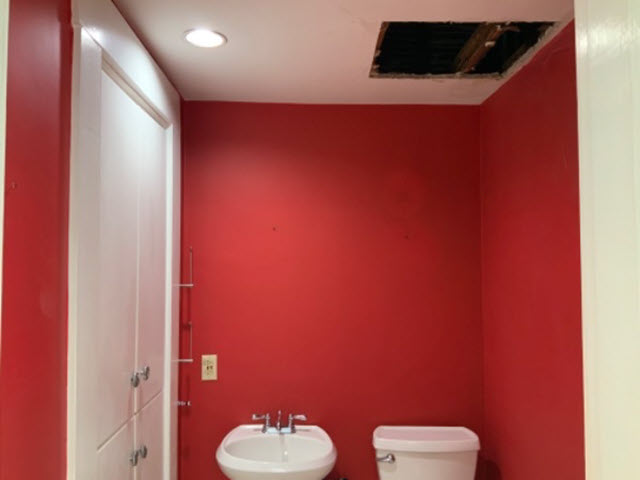 photo of powder room before being painted