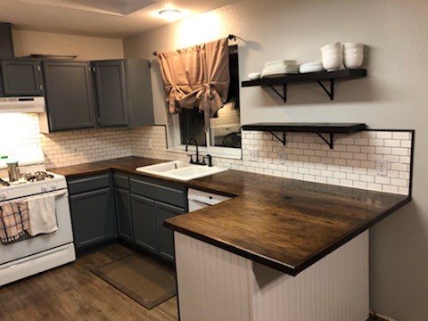 CertaPro Painters of Spokane, WA paints kitchen cabinets after