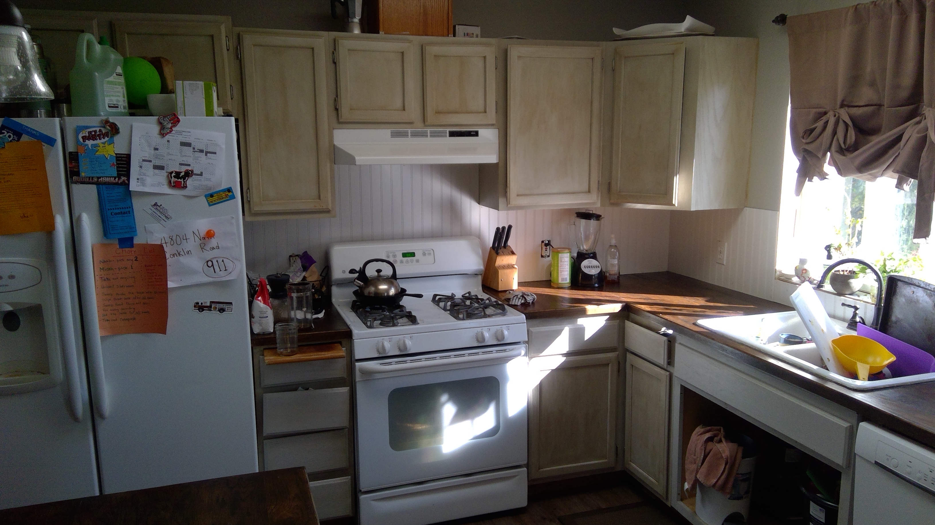 Kitchen Cabinet Painting Before by CertaPro Painters of Spokane, WA