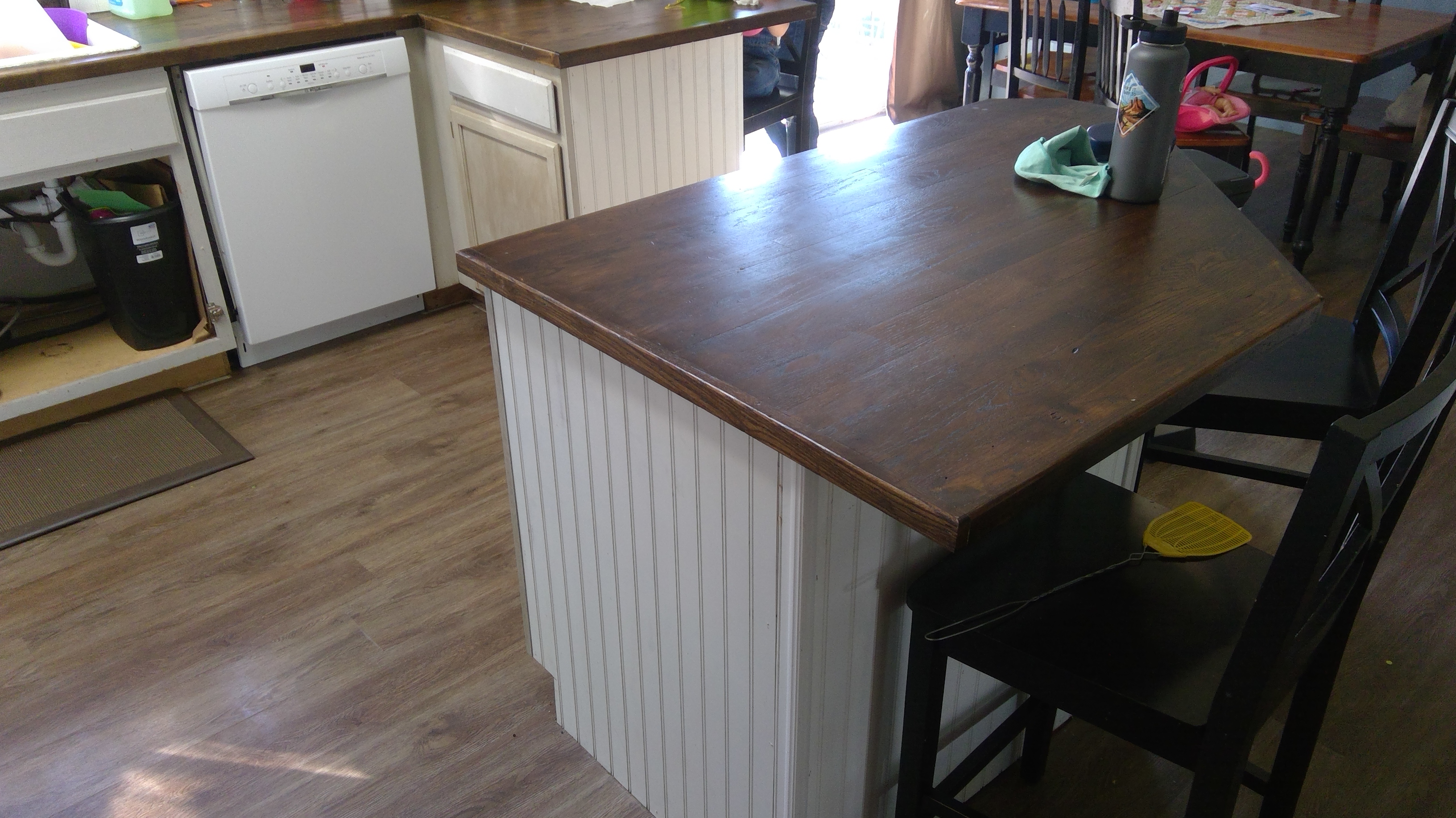 CertaPro Painters of Spokane, WA paints kitchen cabinets before