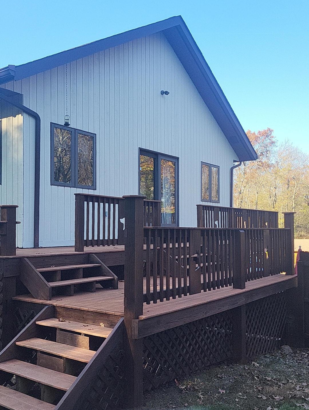 home with white paint and deck