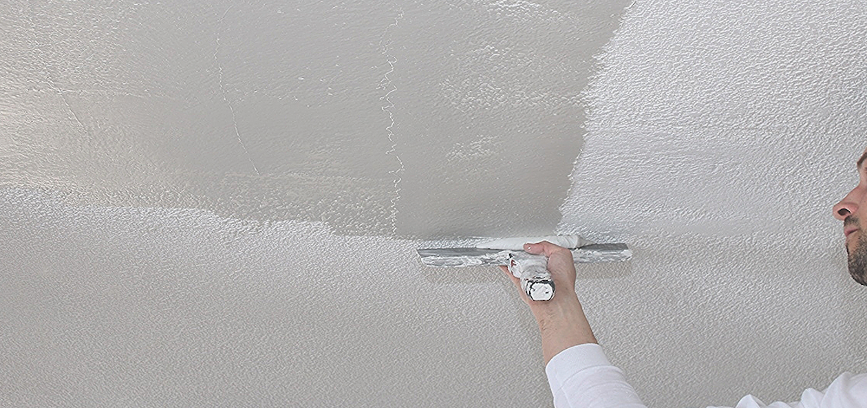 Paint contractor inspecting work