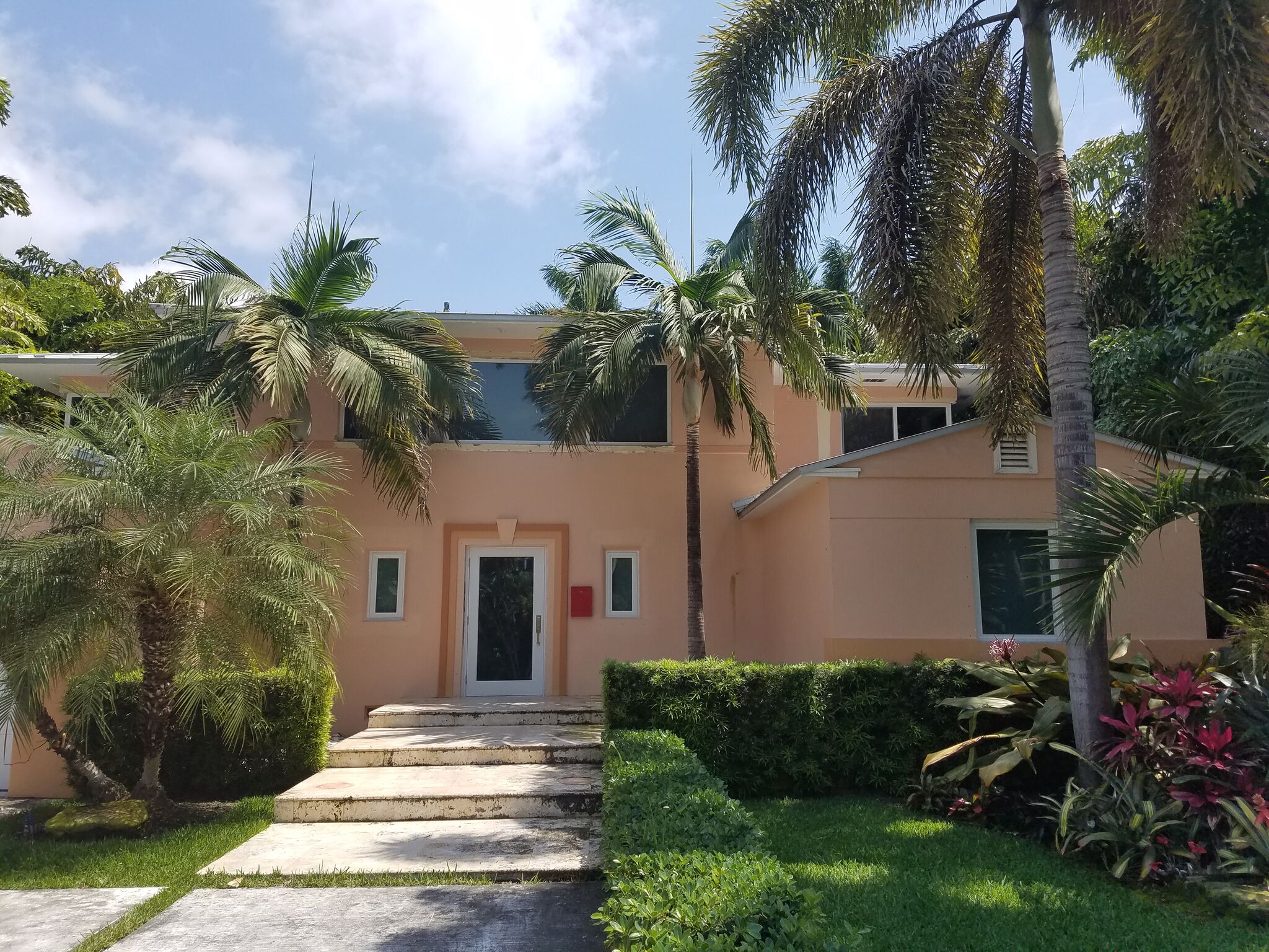 Exterior of stucco home in Miami before being painted by CertaPro of North Miami.