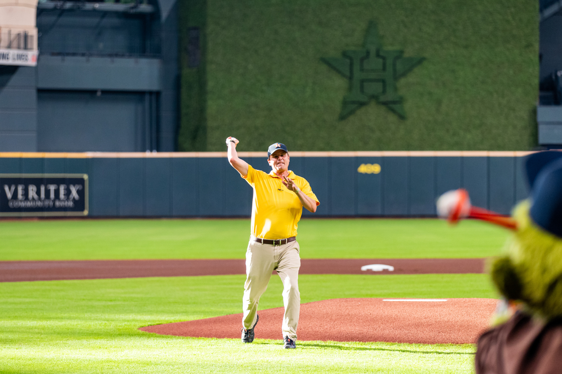 Mark Potts throwing Astros game first pitch
