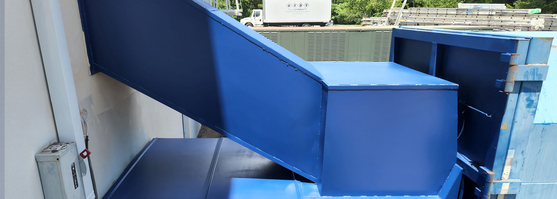 trash shoot & compactor after painting