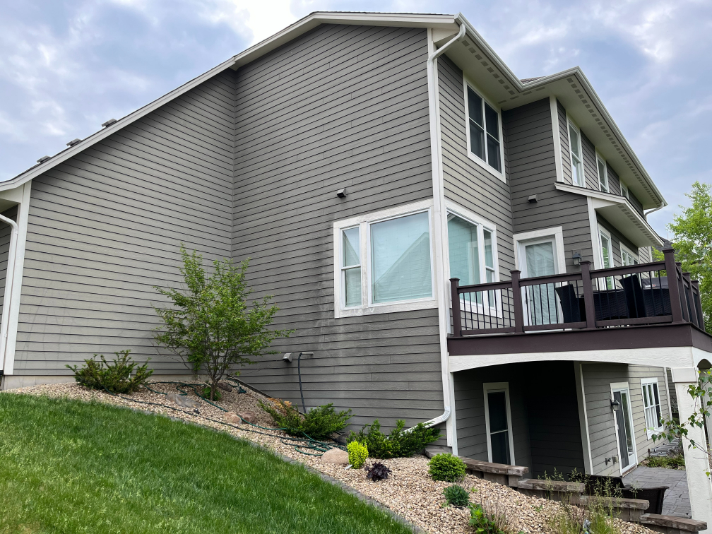 View of repainted house in Plymouth from the side, before painting