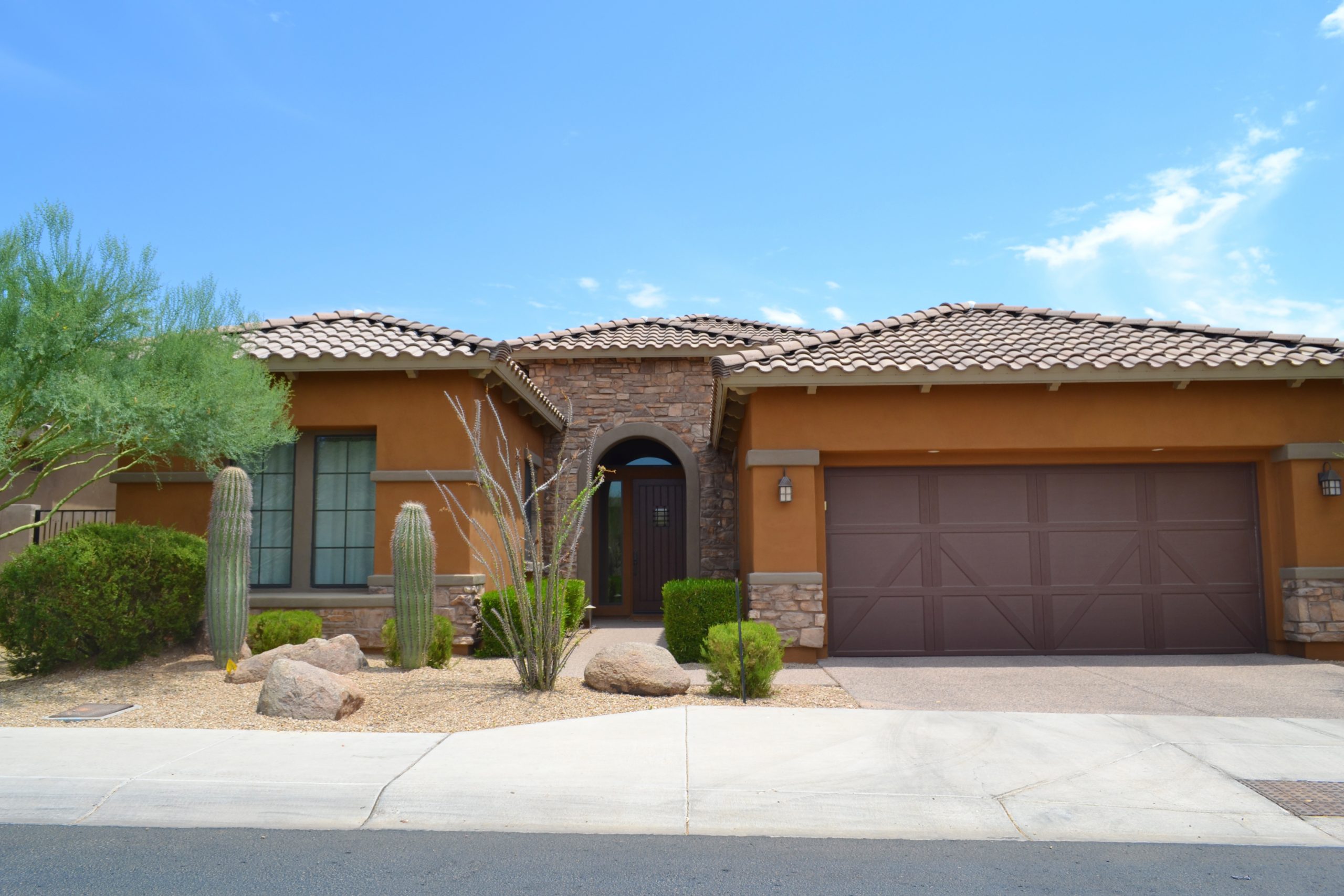 A burnt orange stucco home in Arizona.