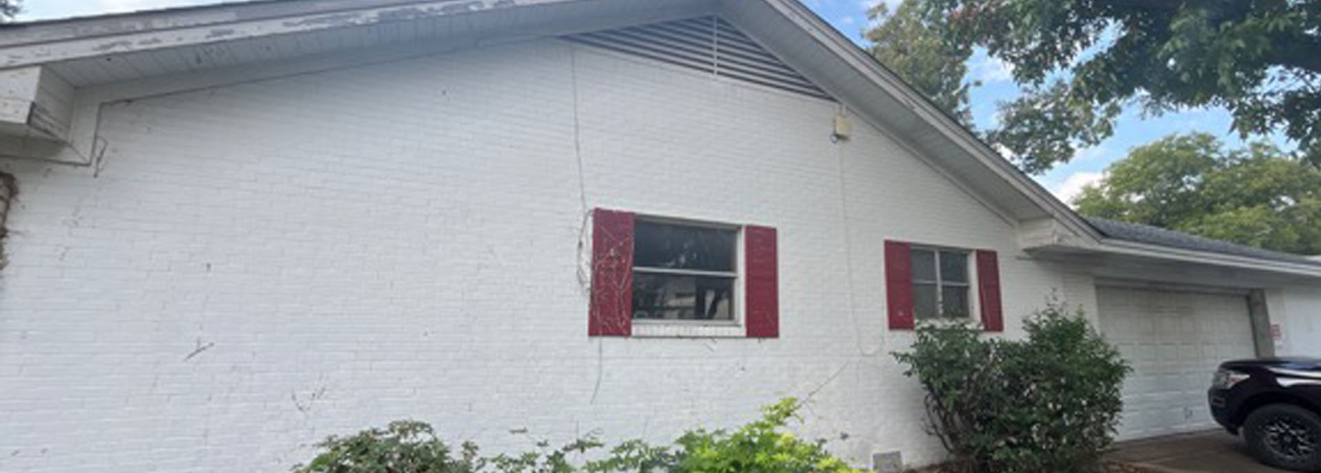 Before Exterior White Brick Painting in Georgetown, TX