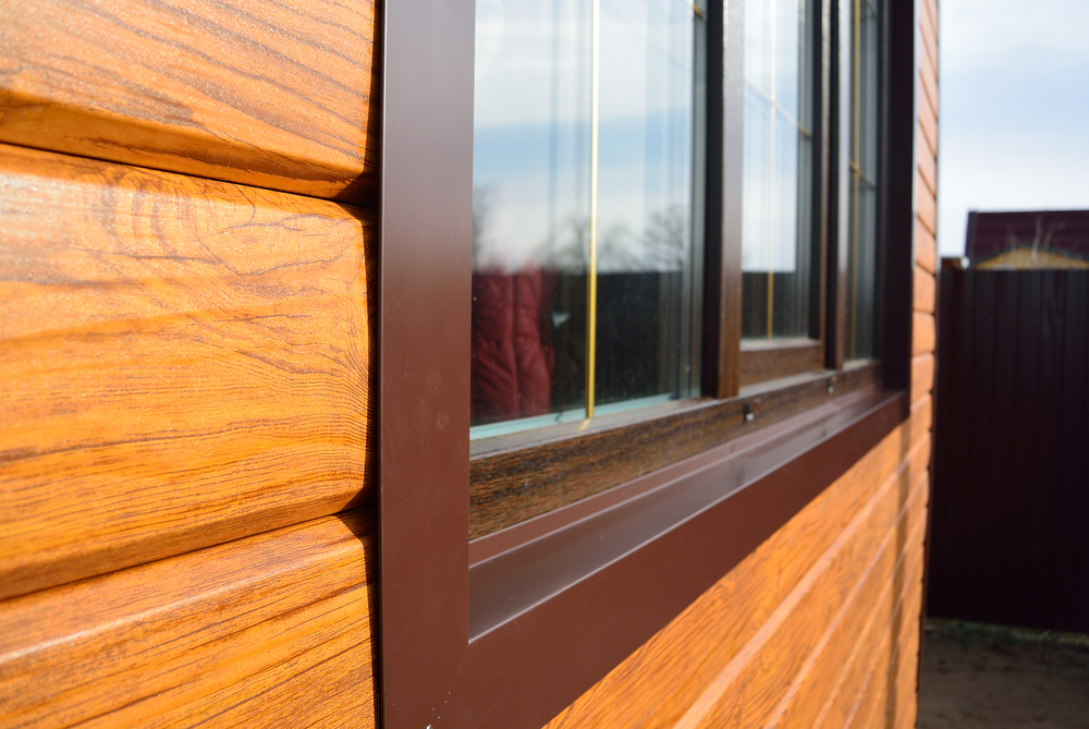 Window on wooden home exterior