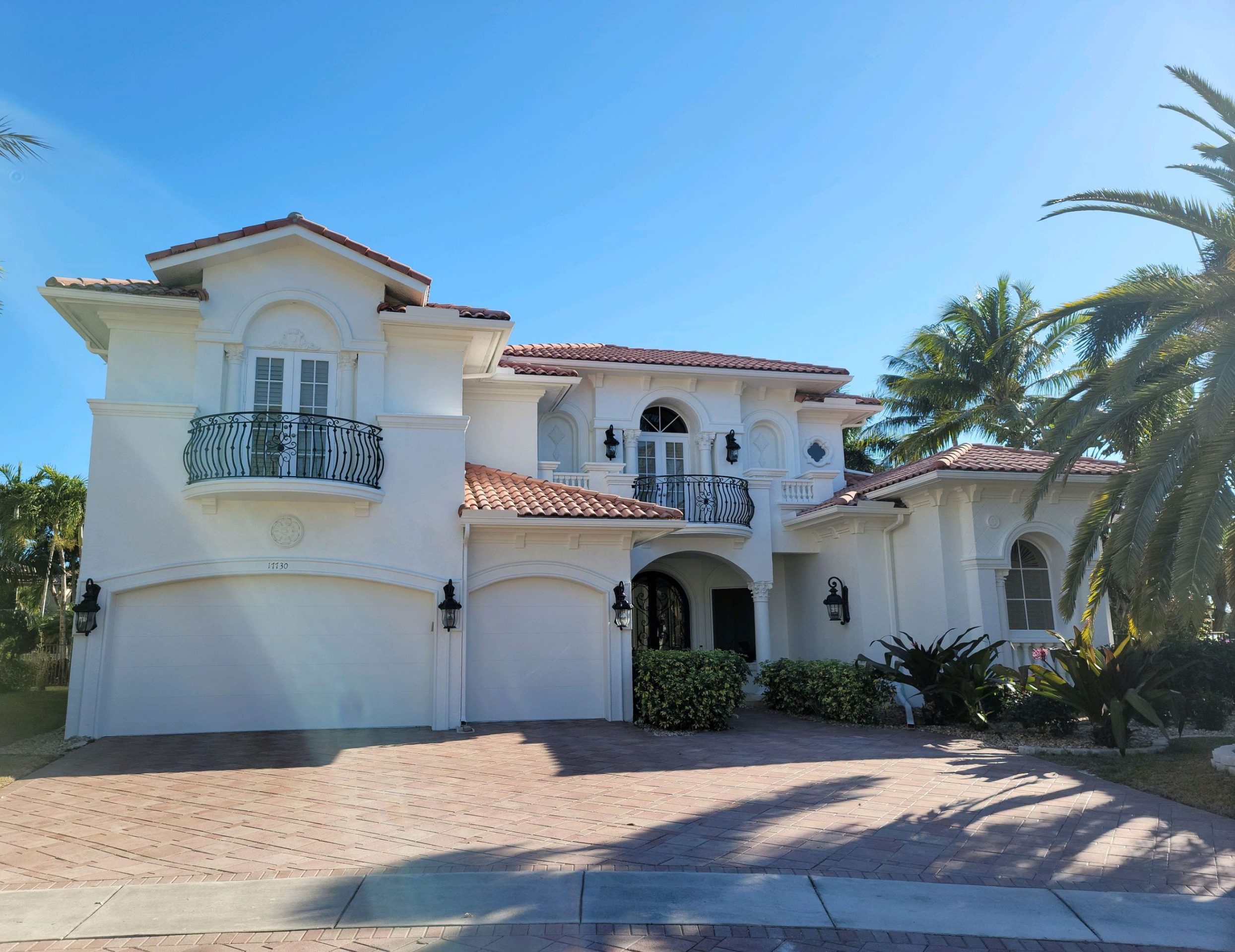 Residential Exterior Stucco Painting Before & After After