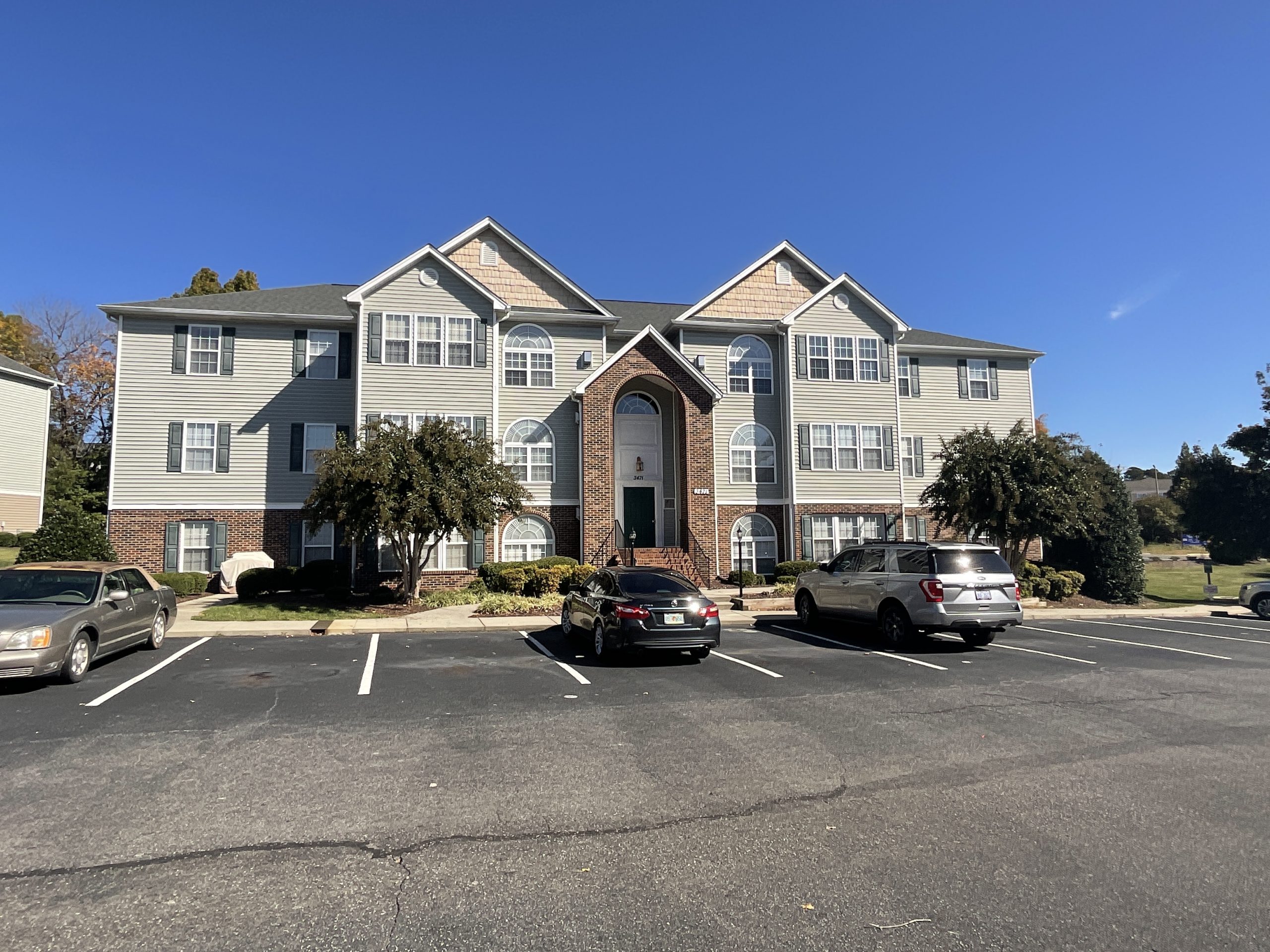 before exterior painting of shudders, entrance, and railings