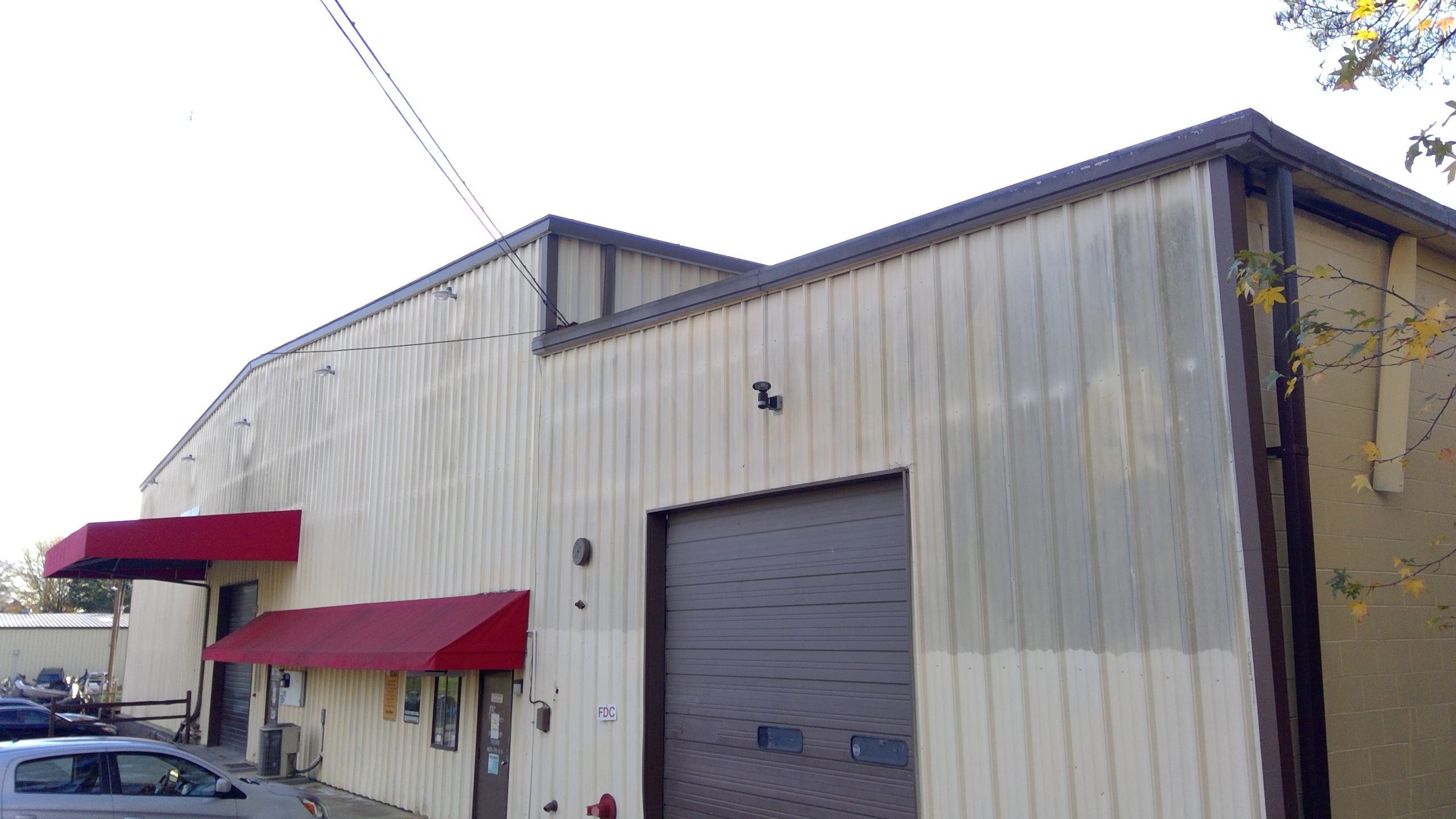 Front Building Commercial painting in Durham, NC - Before