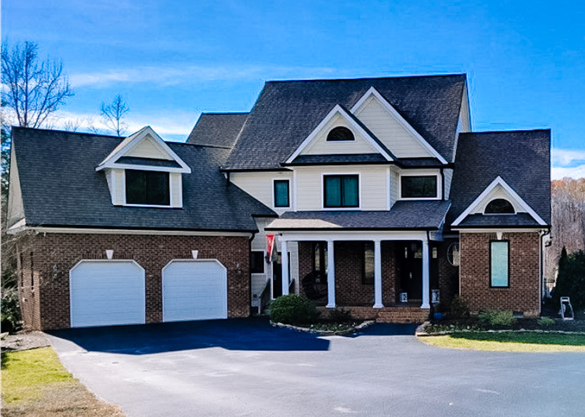 before exterior painting of two car garage home