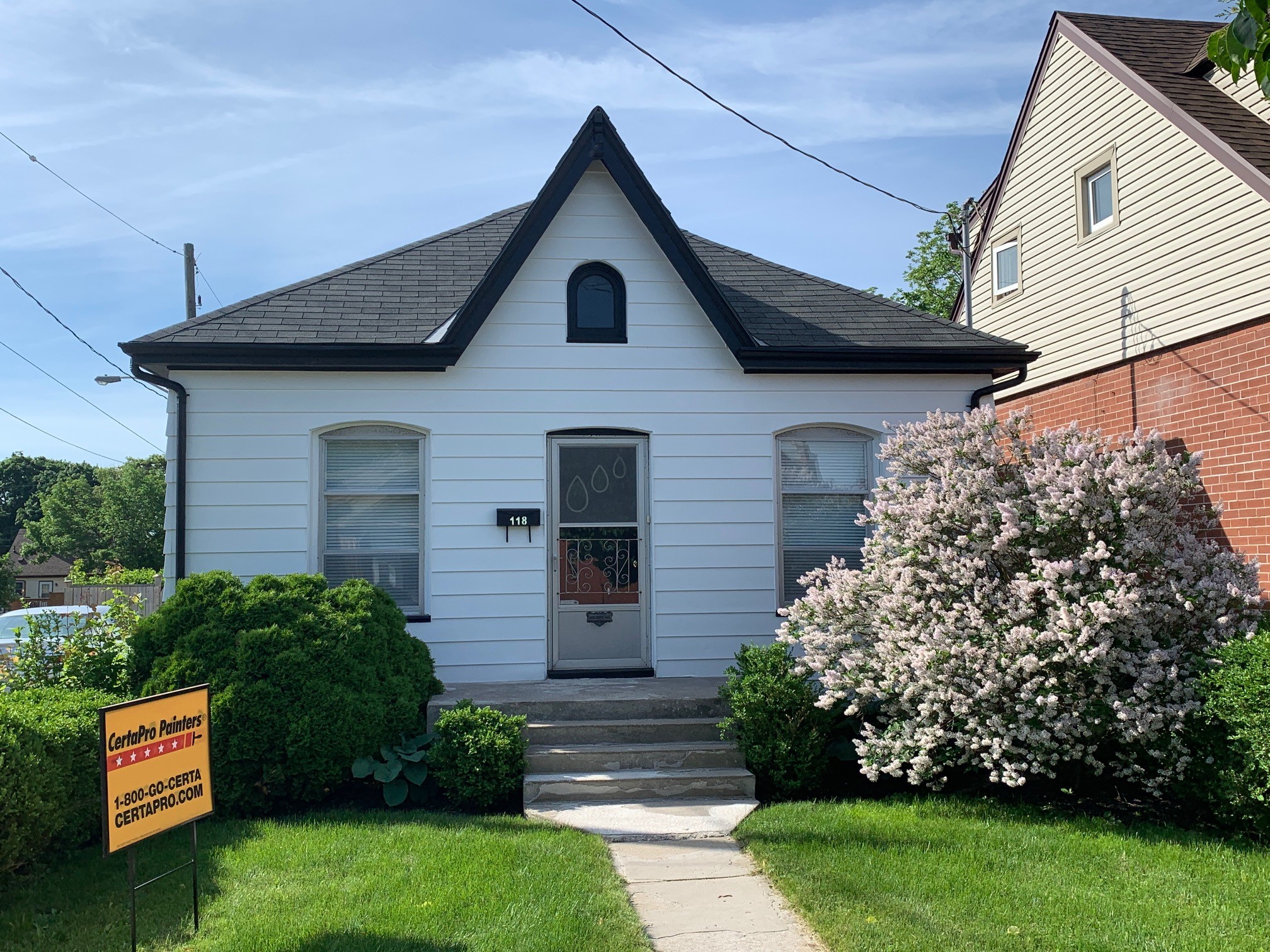 Beautiful Freshly Painted White and Black Home After