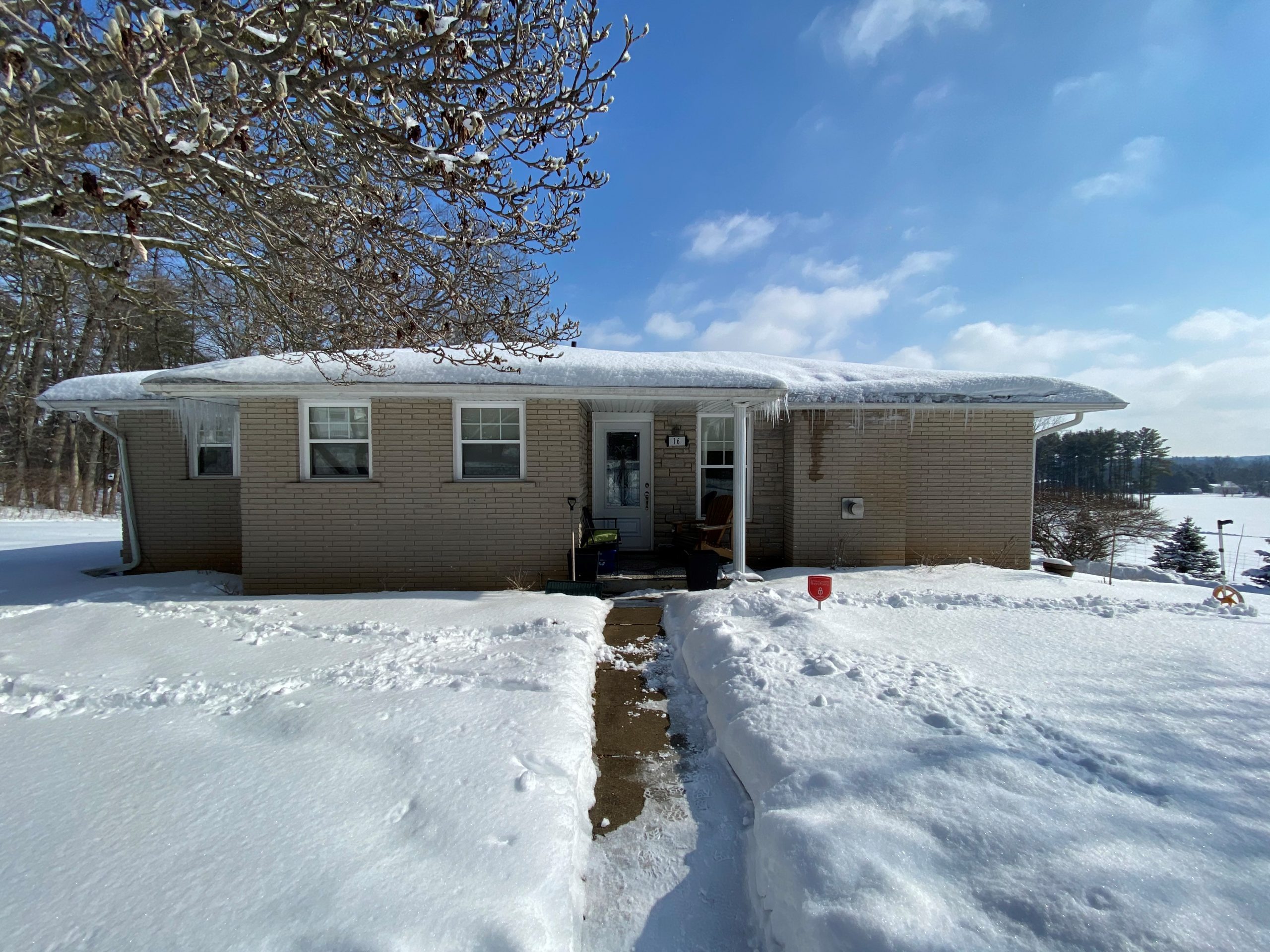 brick home before painting