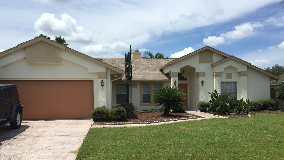  after photo of repainted house in orlando