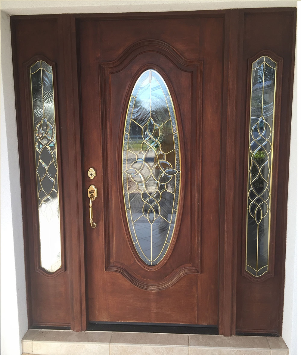 Before photo of refinished wooden front door Oviedo, FL