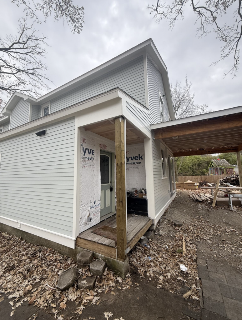 house with light grey painted siding