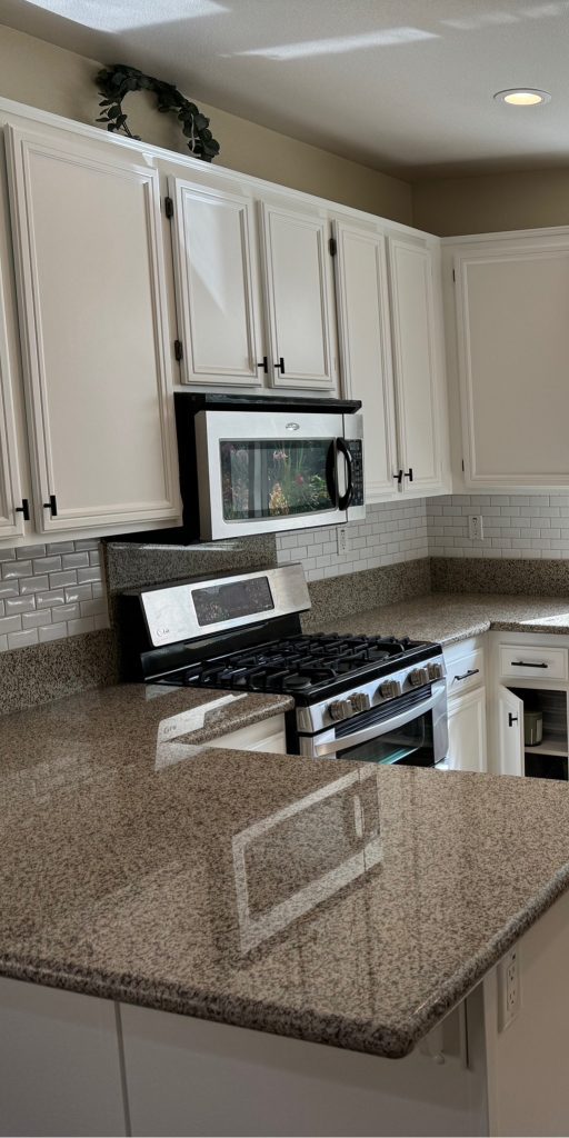 kitchen cabinets after being refinished.