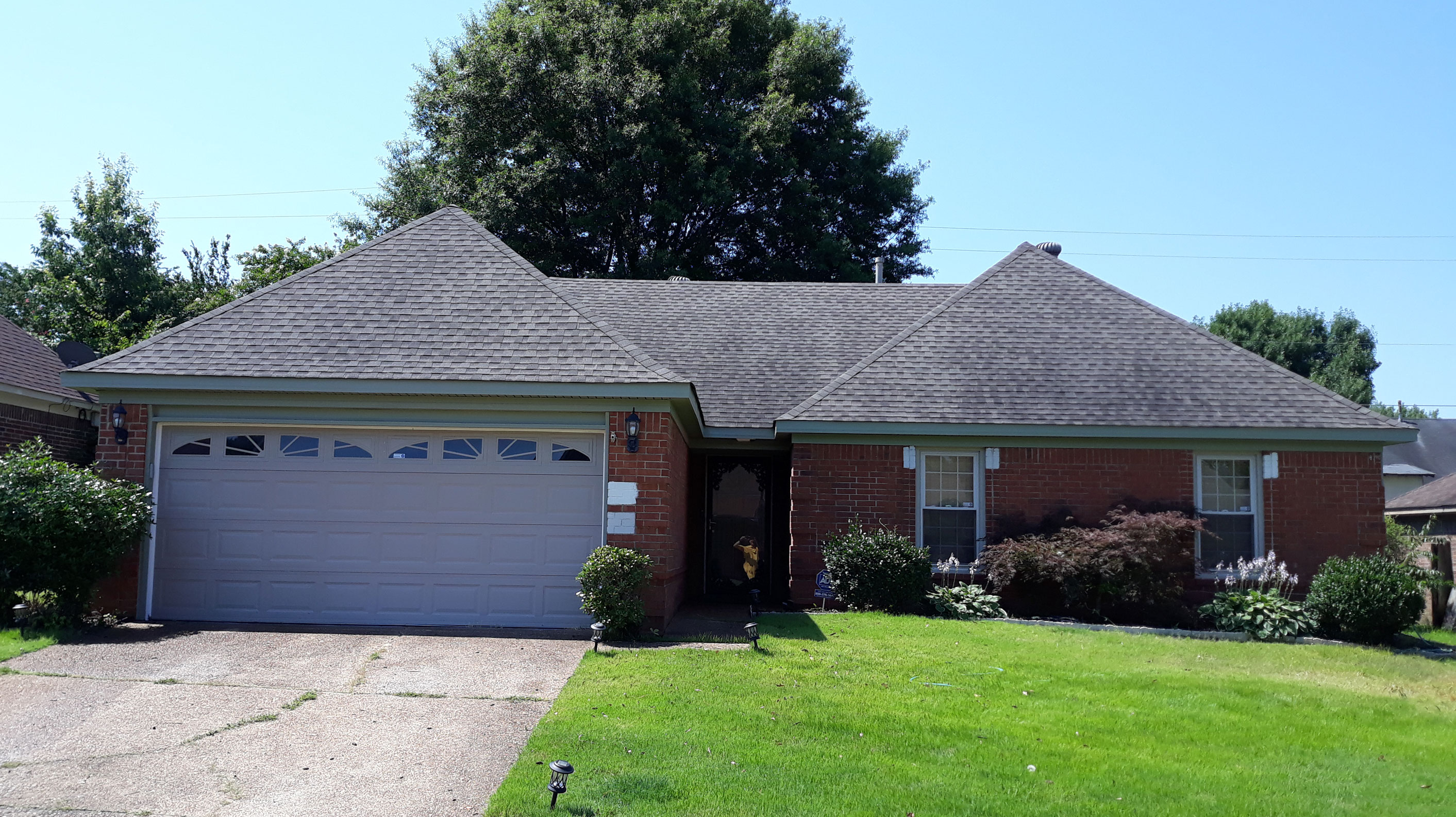 Brick home before painting