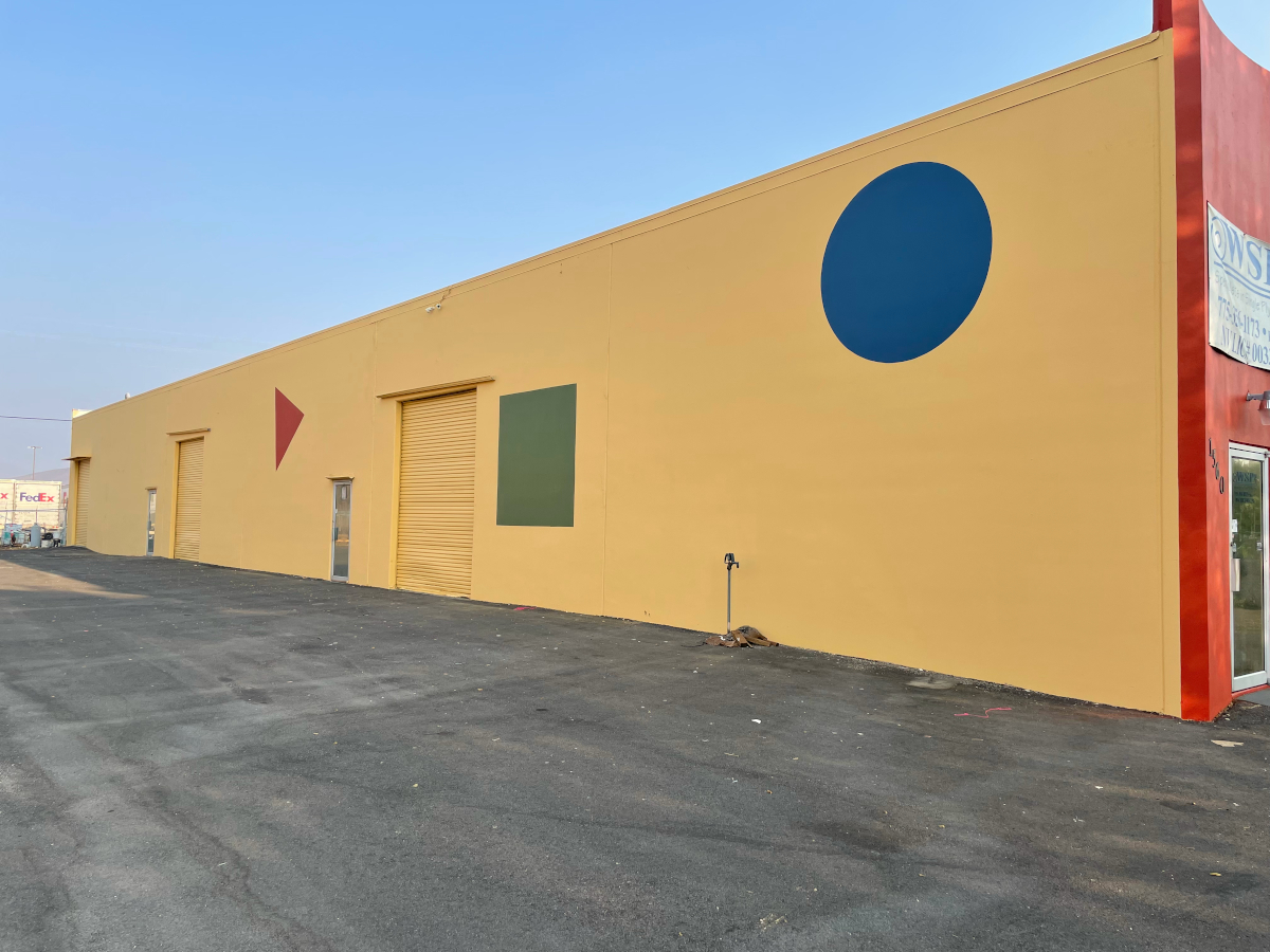 After completion of exterior painting job on a commercial building in Sparks, NV.