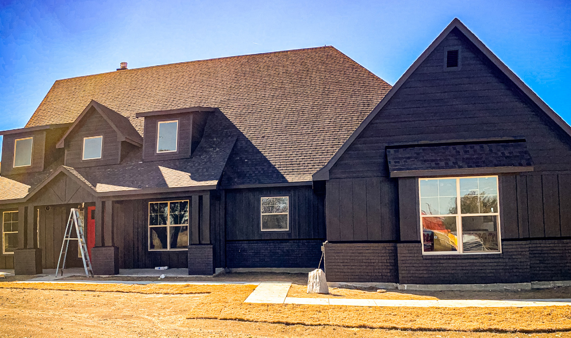 White Exterior Repainted Coal Black After